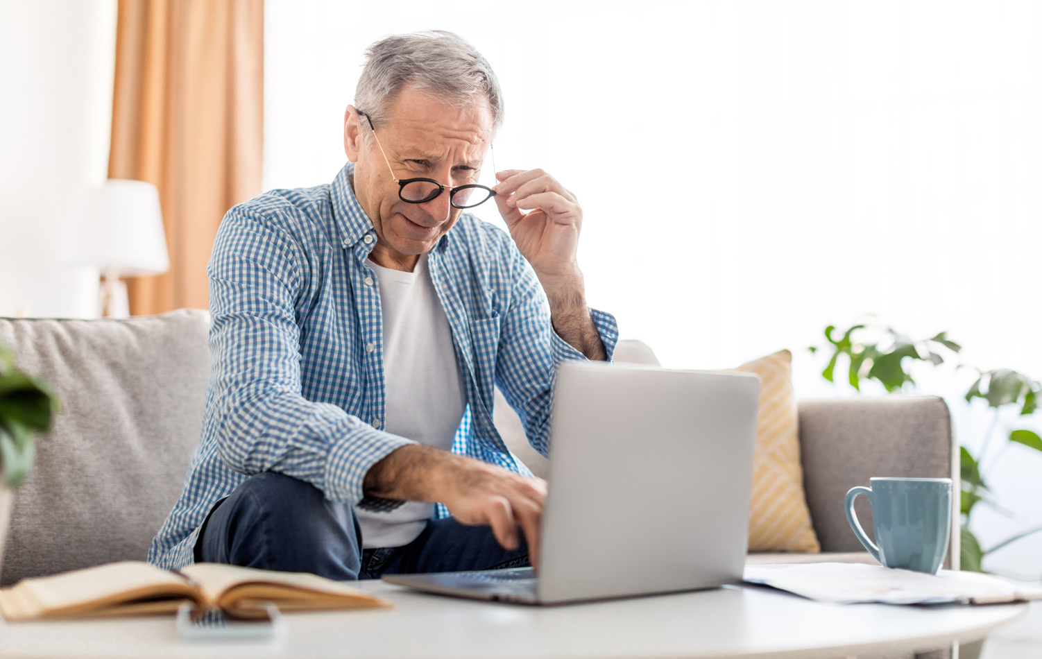 Senior man using a laptop