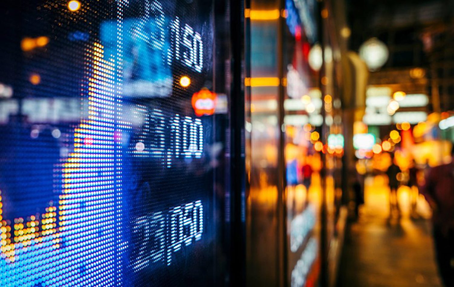 A digital screen displaying an upward trend on a line graph