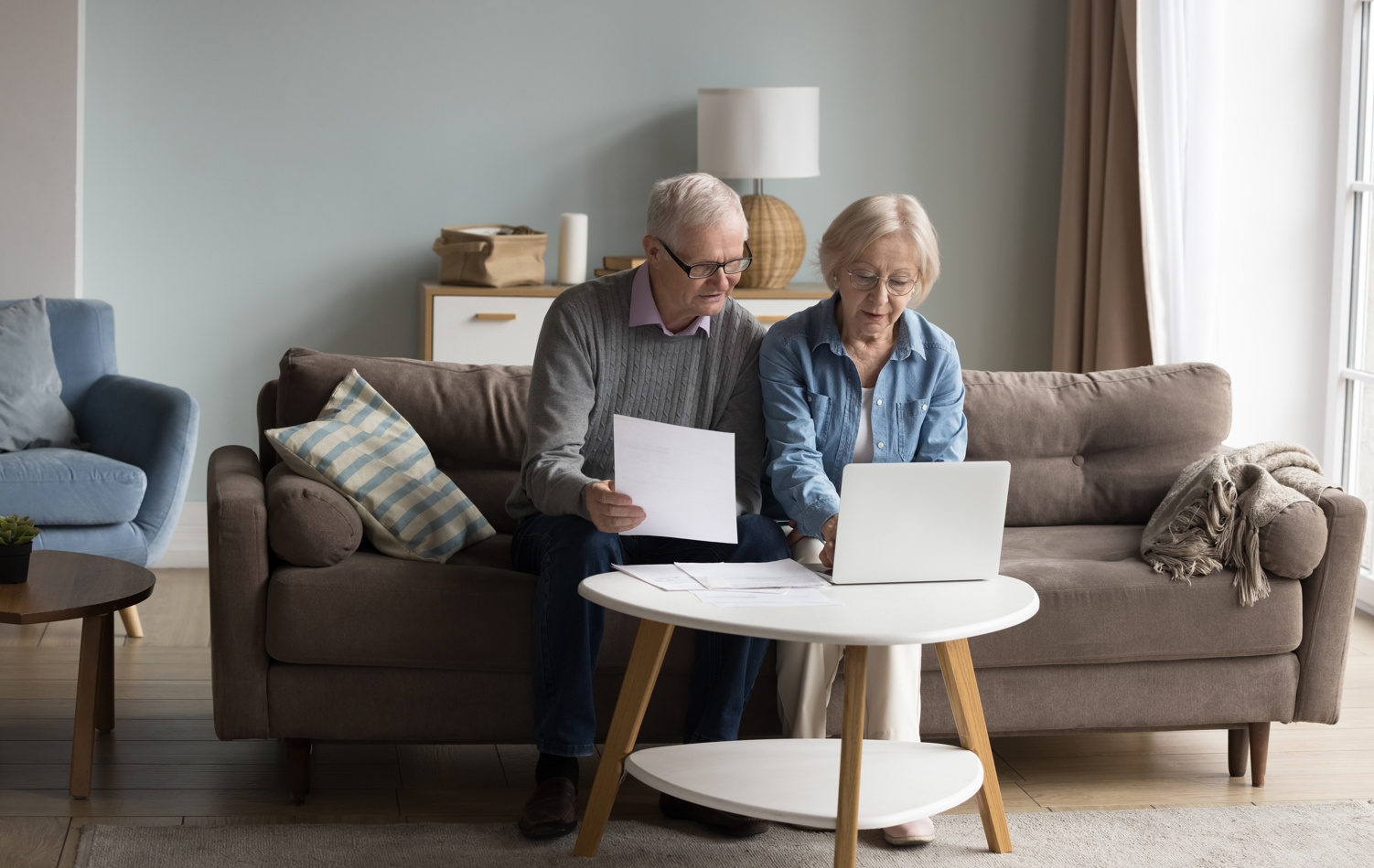 Couple looking at divorce settlement papers
