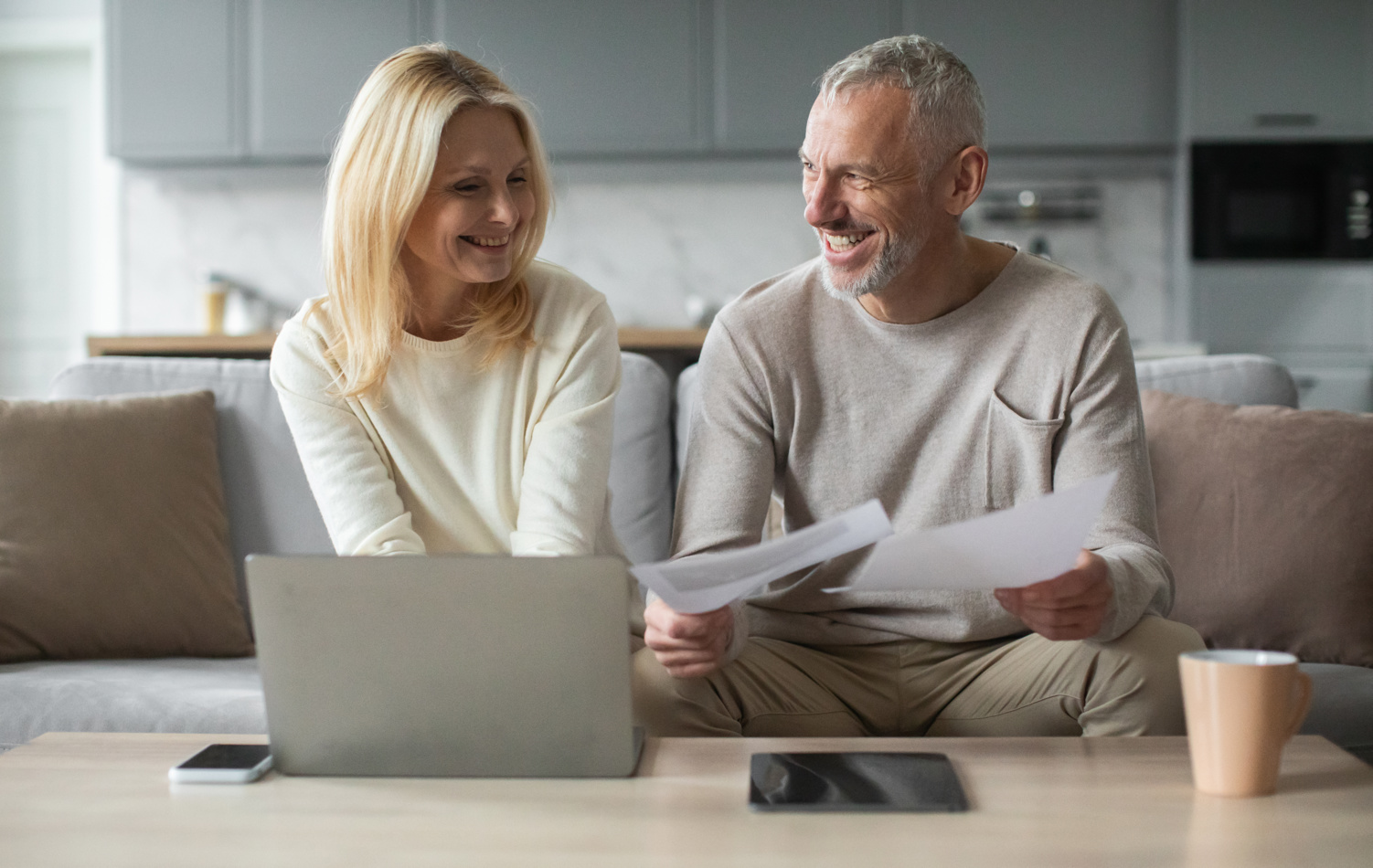 Man and Woman using a laptop