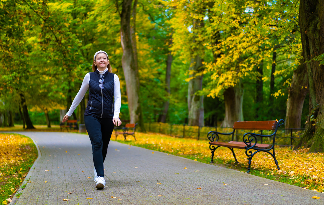 Woman walking in a park